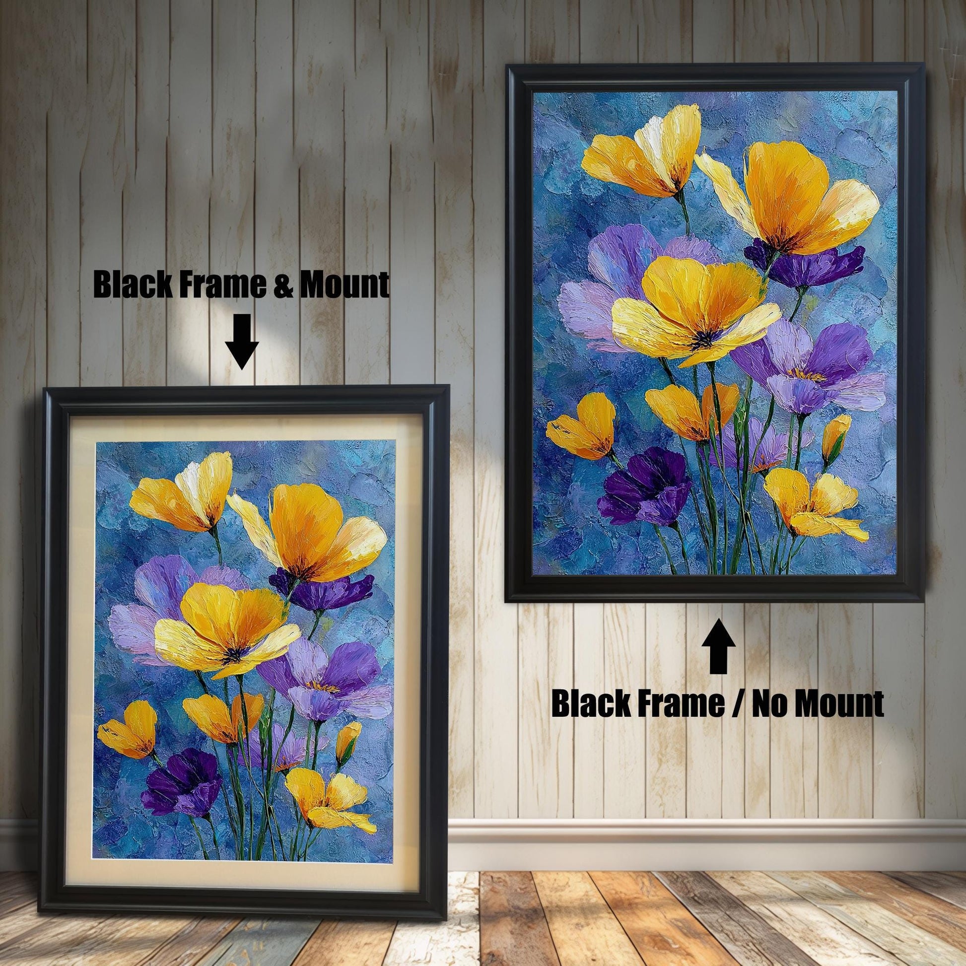 Two framed art prints of yellow and purple flowers on a wooden floor. The print on the left is in a black frame with a mount, and the one on the right is in a black frame without a mount.