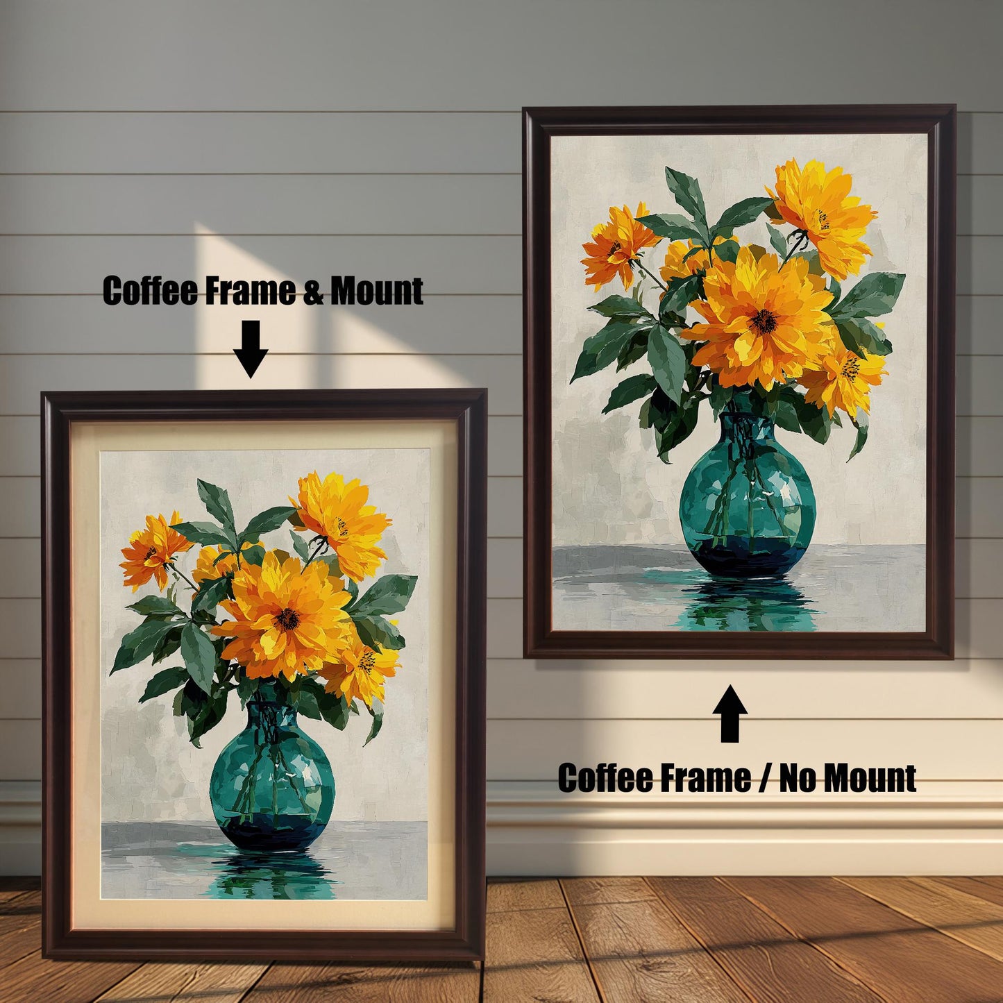 Two framed art prints of yellow flowers in a green vase on a wooden floor. The print on the left is in a coffee-colored frame with a mount, and the one on the right is in a coffee-colored frame without a mount.