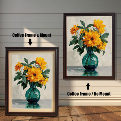 Two framed art prints of yellow flowers in a green vase on a wooden floor. The print on the left is in a coffee-colored frame with a mount, and the one on the right is in a coffee-colored frame without a mount.