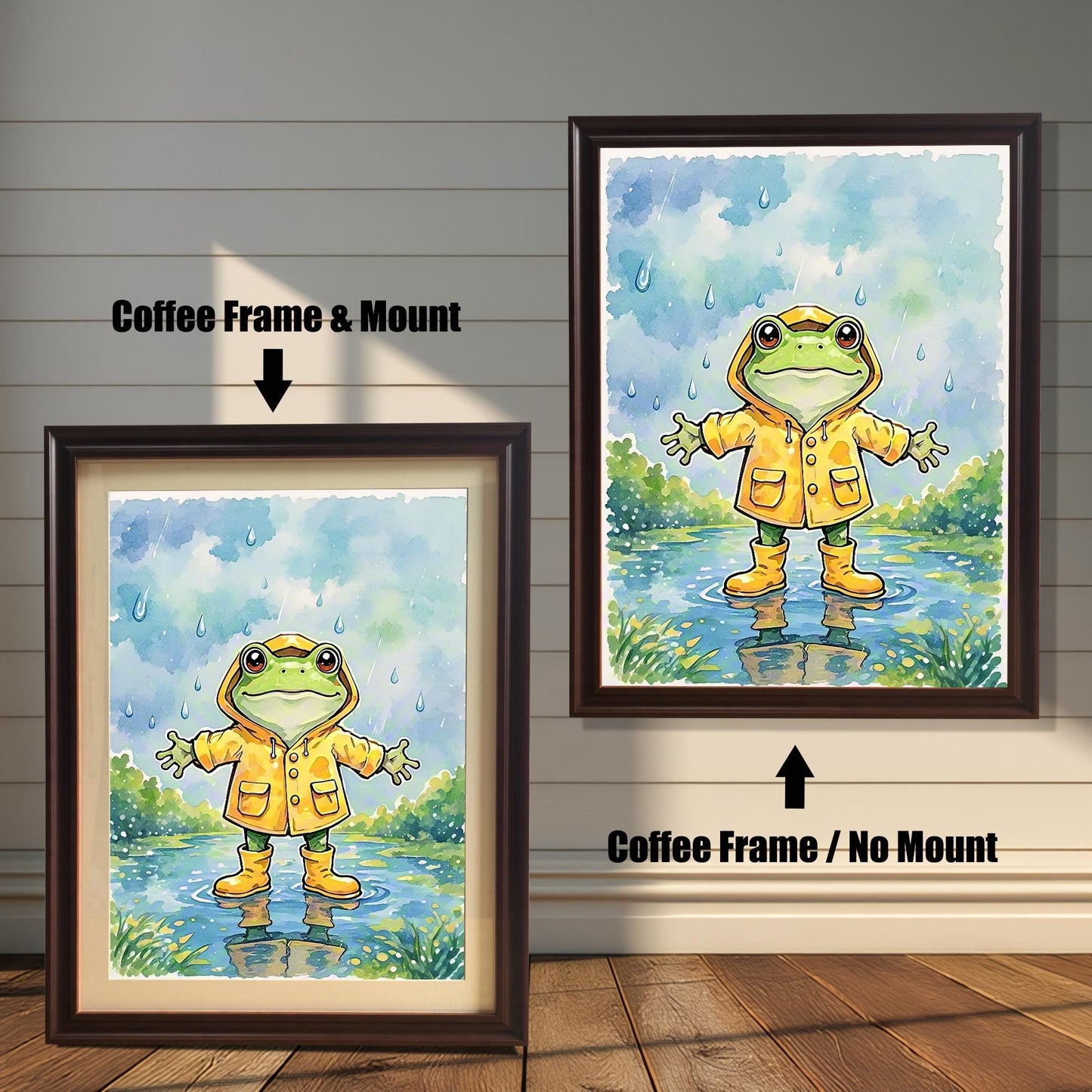 Two framed art prints of a frog in a raincoat. The image on the left has a coffee-colored frame with a white mount, while the one on the right has a coffee-colored frame with no mount.