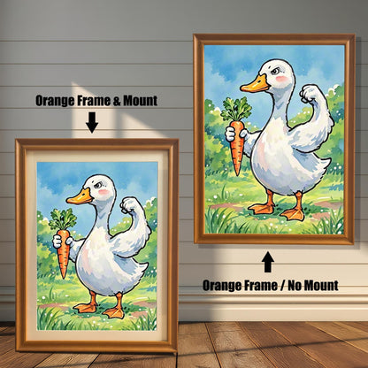 Two framed art prints of a duck with a carrot. The image on the left has an orange frame with a white mount, while the one on the right has an orange frame with no mount.