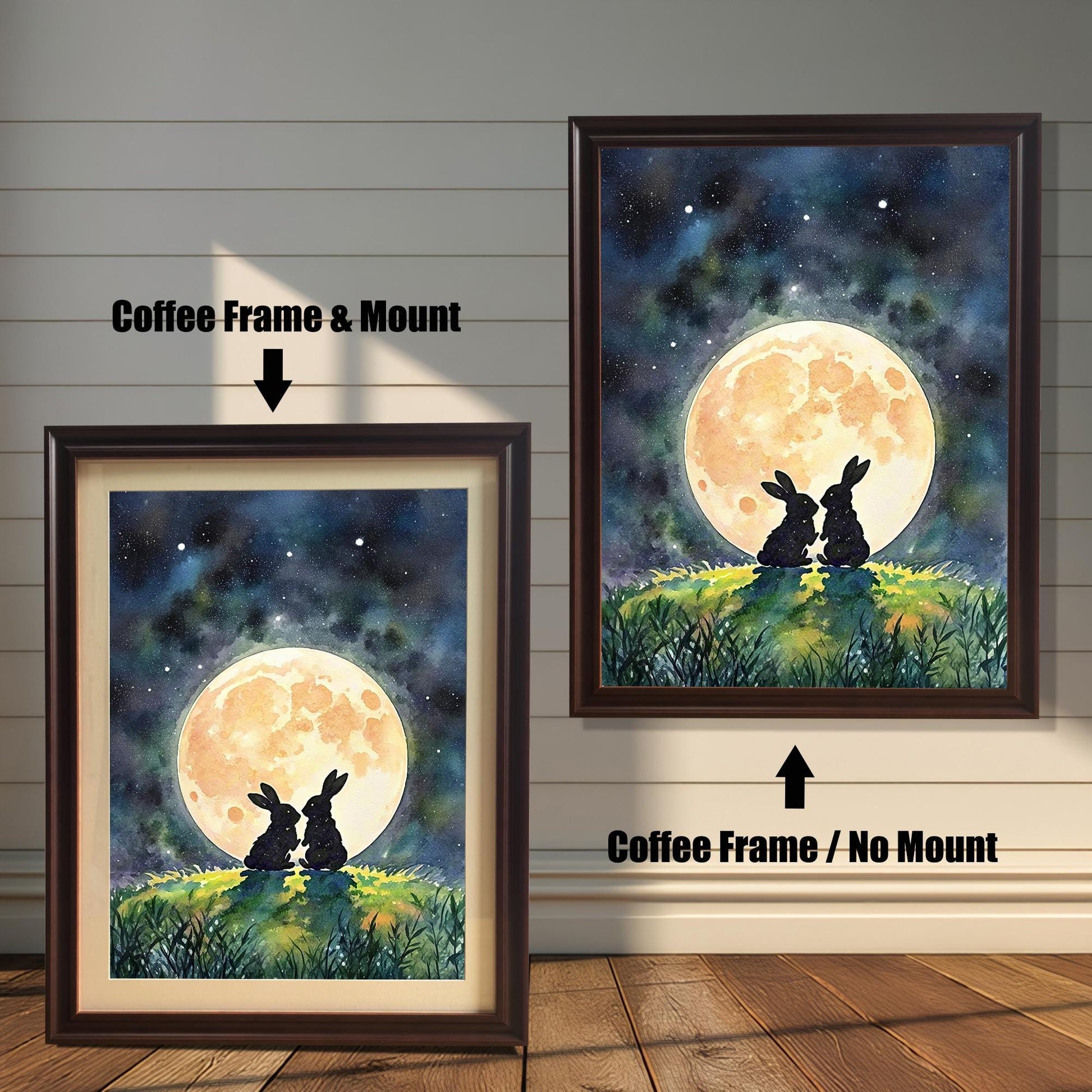 Two framed prints of rabbits under a moon. The one on the left has a "Coffee Frame & Mount," and the right has a "Coffee Frame / No Mount."
