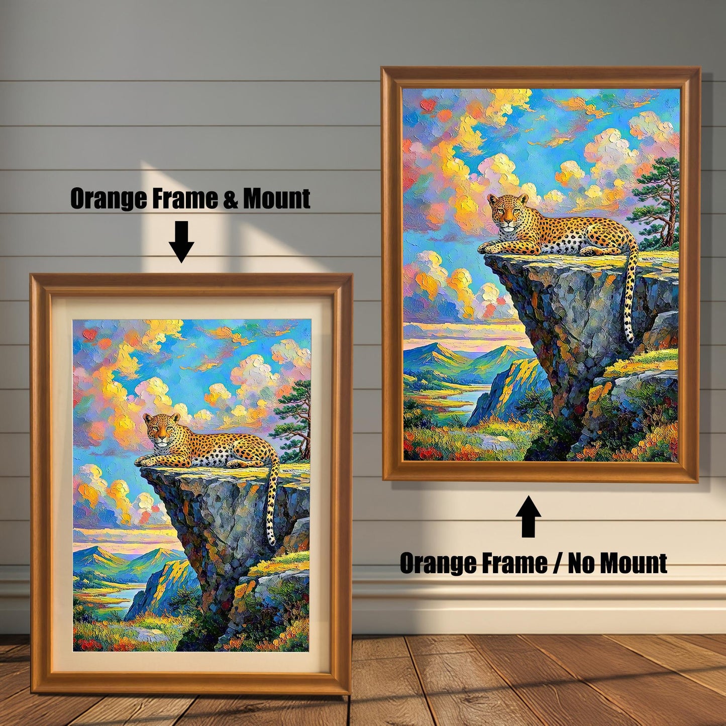 Two framed paintings of a leopard on a cliffside. The one on the left has an orange frame with a mount, and the one on the right has an orange frame with no mount.