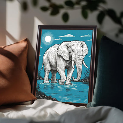 A framed painting of an elephant standing in water, with a full moon in a blue sky. The frame is brown and the art is propped on a bed with pillows.