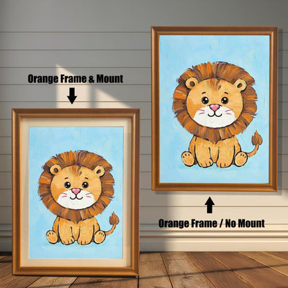 Two versions of the same cartoon lion painting. On the left, an orange frame with a white mount. On the right, the same frame without a mount.