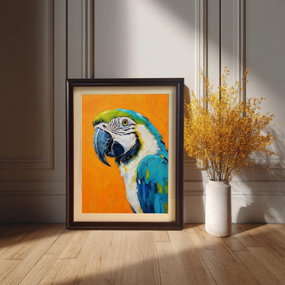A framed painting of a parrot leans against a white paneled wall on a wooden floor, next to a vase with dried yellow flowers.