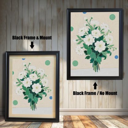 A painting of a bouquet of white flowers, displayed in two black frames. The first frame includes a light-colored mount, and the second is a simple frame without one.