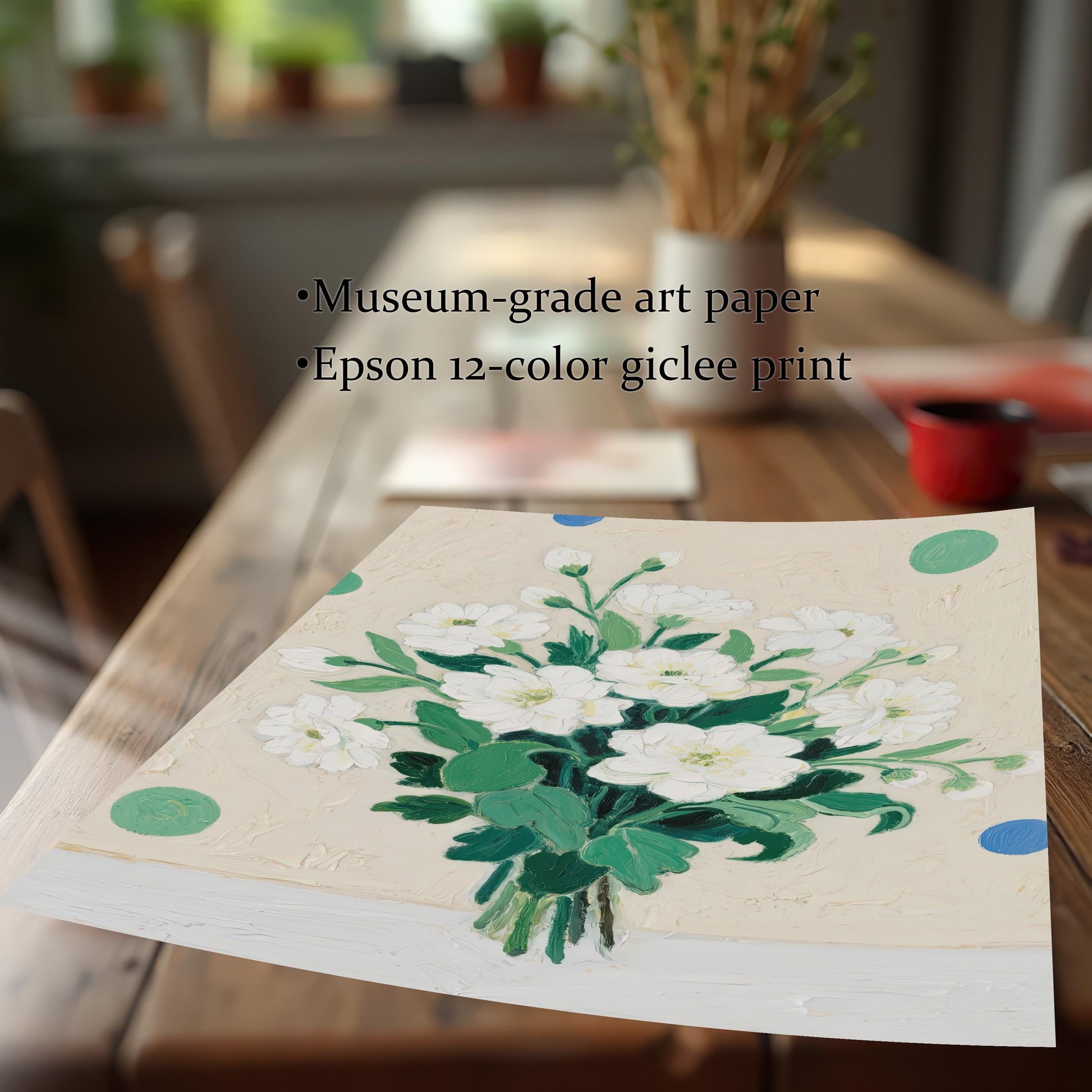 A close-up, angled shot of a painting of white flowers lying on a wooden table. Text highlights its quality, noting it's on museum-grade art paper with an Epson 12-color giclee print.