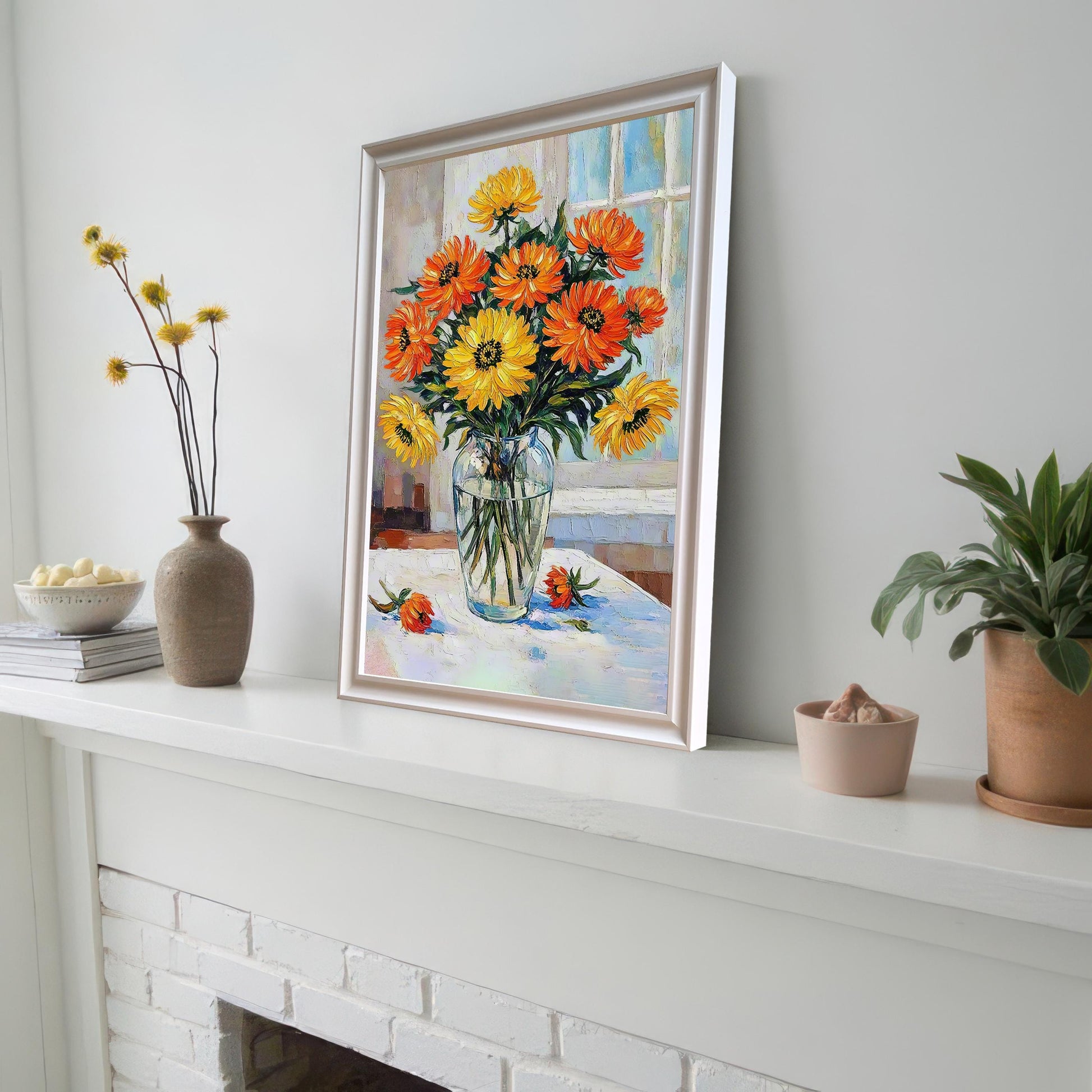 A framed flower print with a white frame propped on a white fireplace mantelpiece next to a couple of vases.