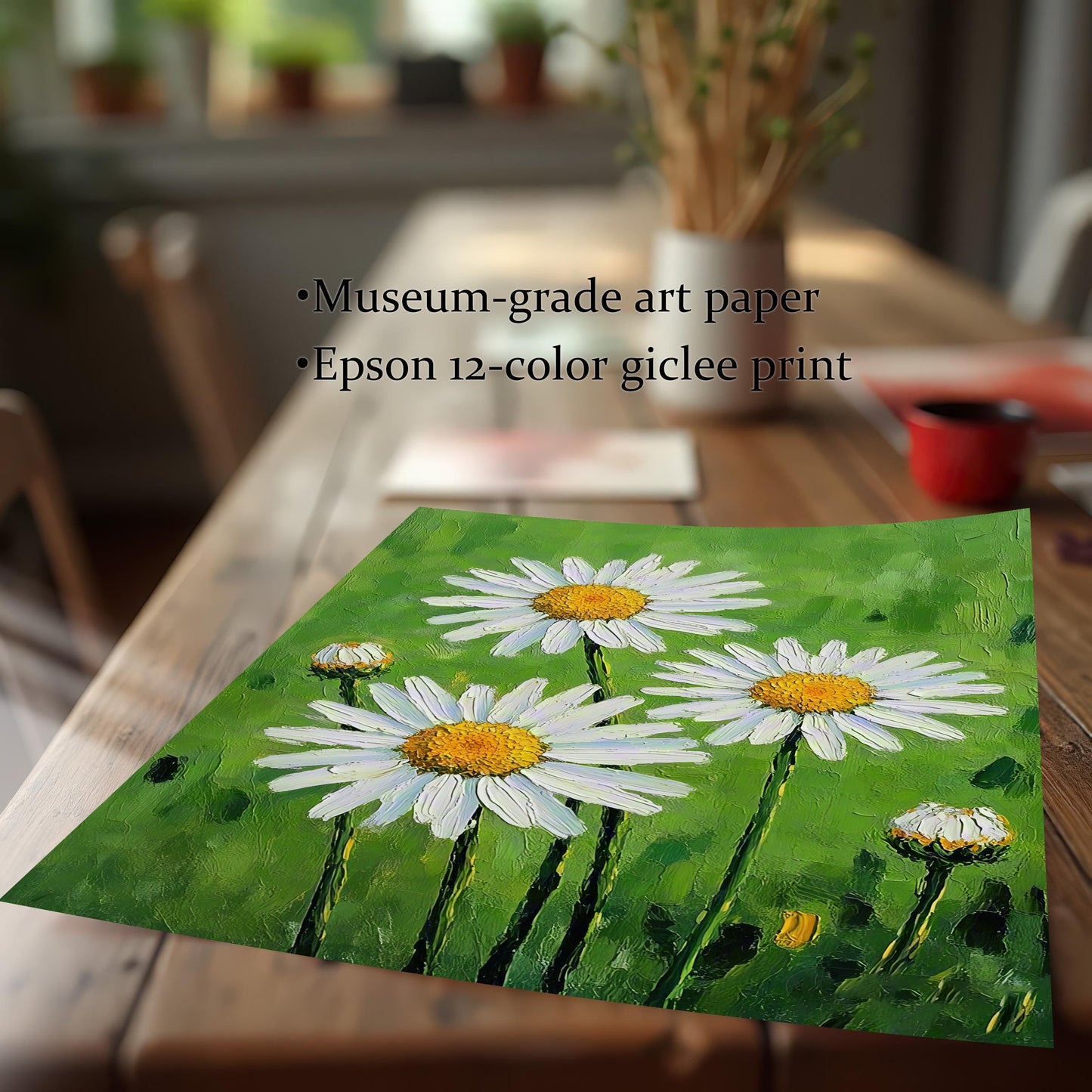 A close-up, angled view of an unframed print of white daisies lying on a wooden table, highlighting its museum-grade art paper and giclee printing.