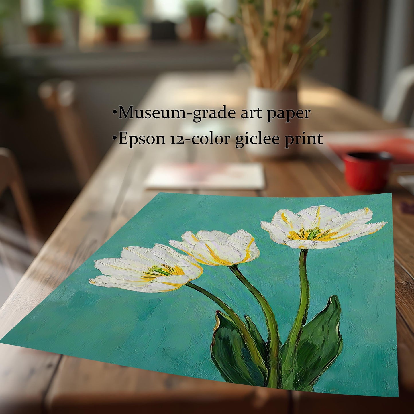 A print of three white tulips on a teal background is shown on a light-colored wooden table. Text next to it lists "Museum-grade art paper" and "Epson 12-color giclee print."