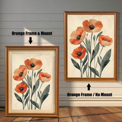 Two orange-colored framed art prints of five orange poppies on a pale background. One has a white mat board and the other does not.