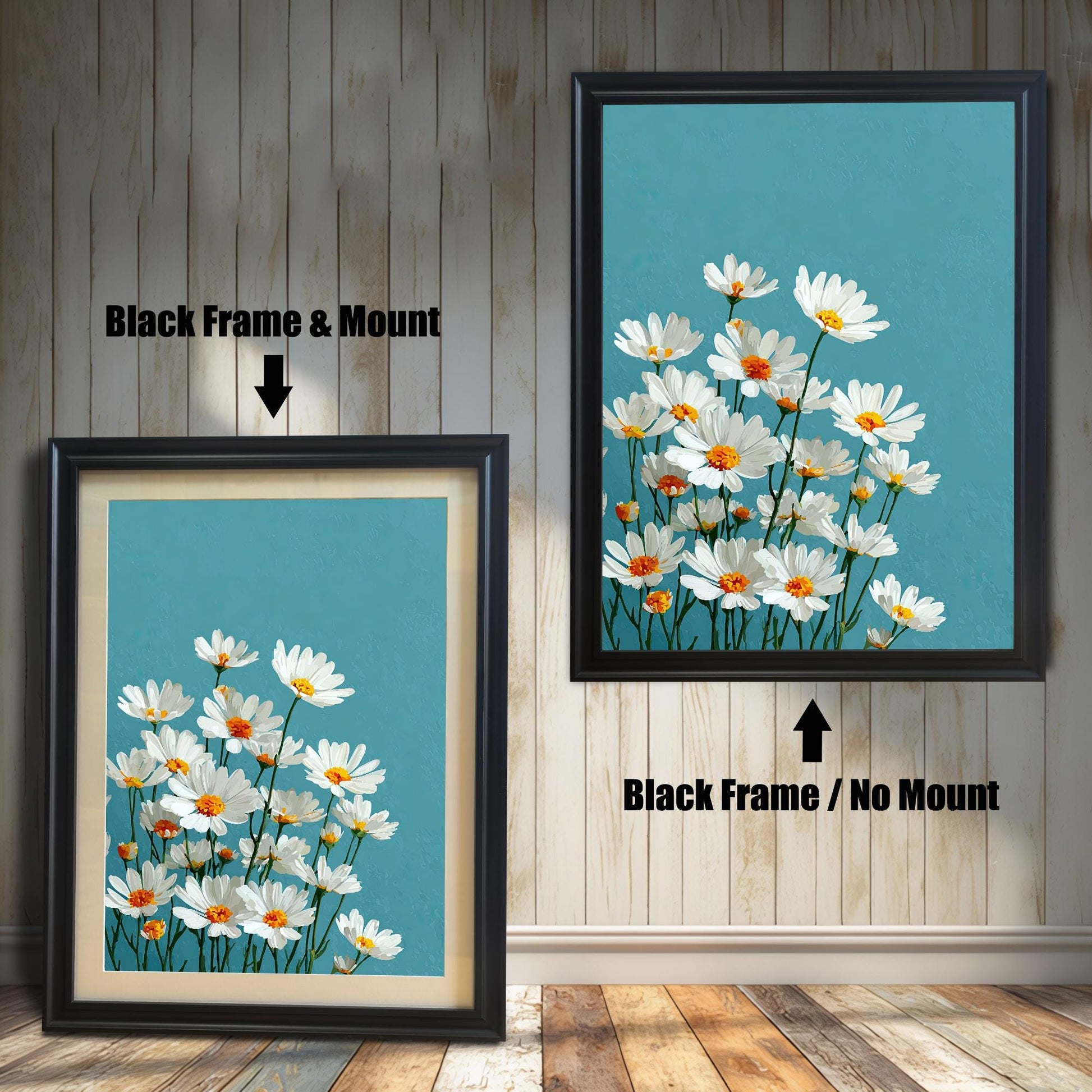 Two art prints of white daisies. The one on the left has a black frame with a white mat. The one on the right has a black frame with no mat.