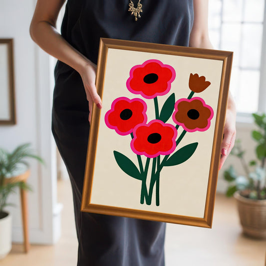 A woman in a black dress holds a framed abstract floral painting with red and brown flowers and a warm orange frame.