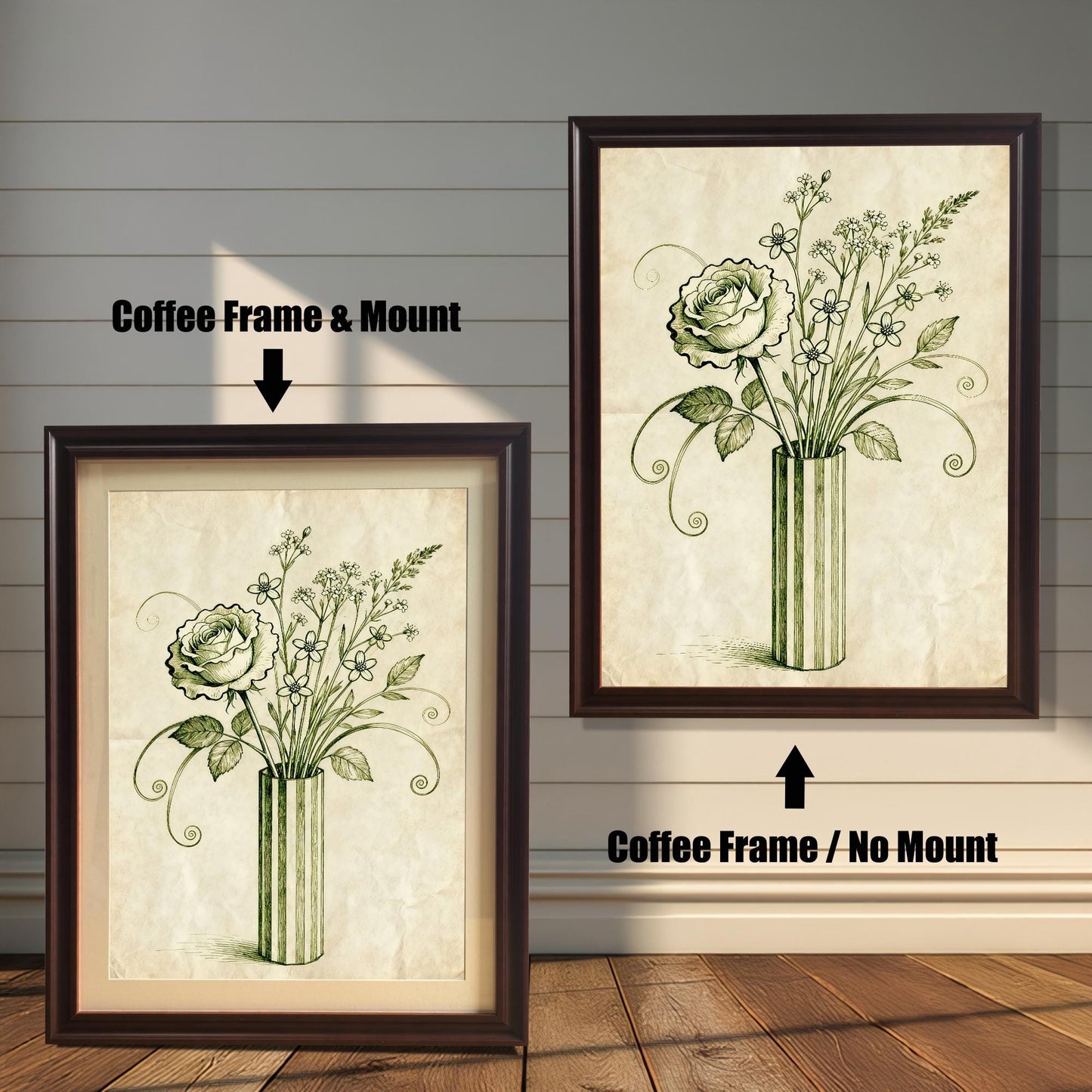 A framed art print of a vintage-style rose and flowers in a vase is shown in two styles against a wooden wall. One has a coffee-colored frame with a white mount, the other is a larger size with the same frame, but no mount.