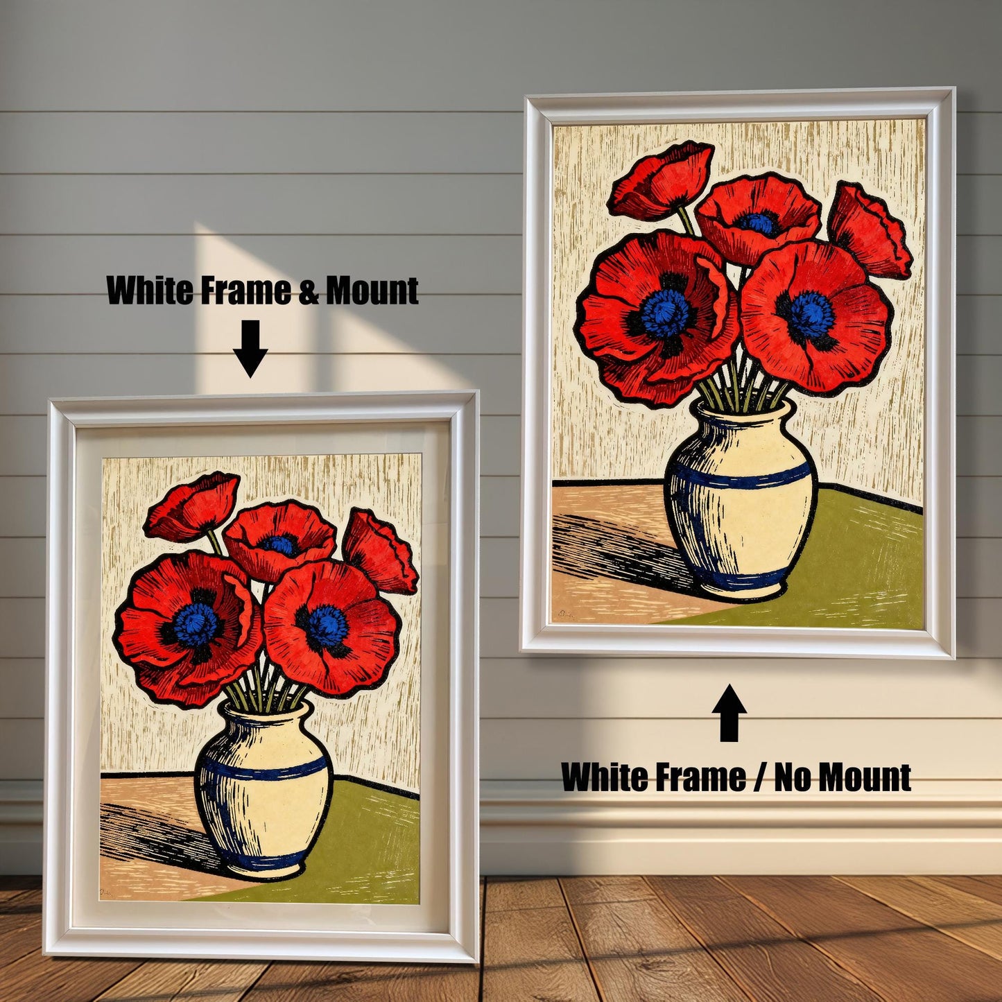 A framed art print of a vase of red poppies is shown in two styles against a wooden wall. One has a white frame with a white mount, the other is a larger size with the same frame, but no mount.