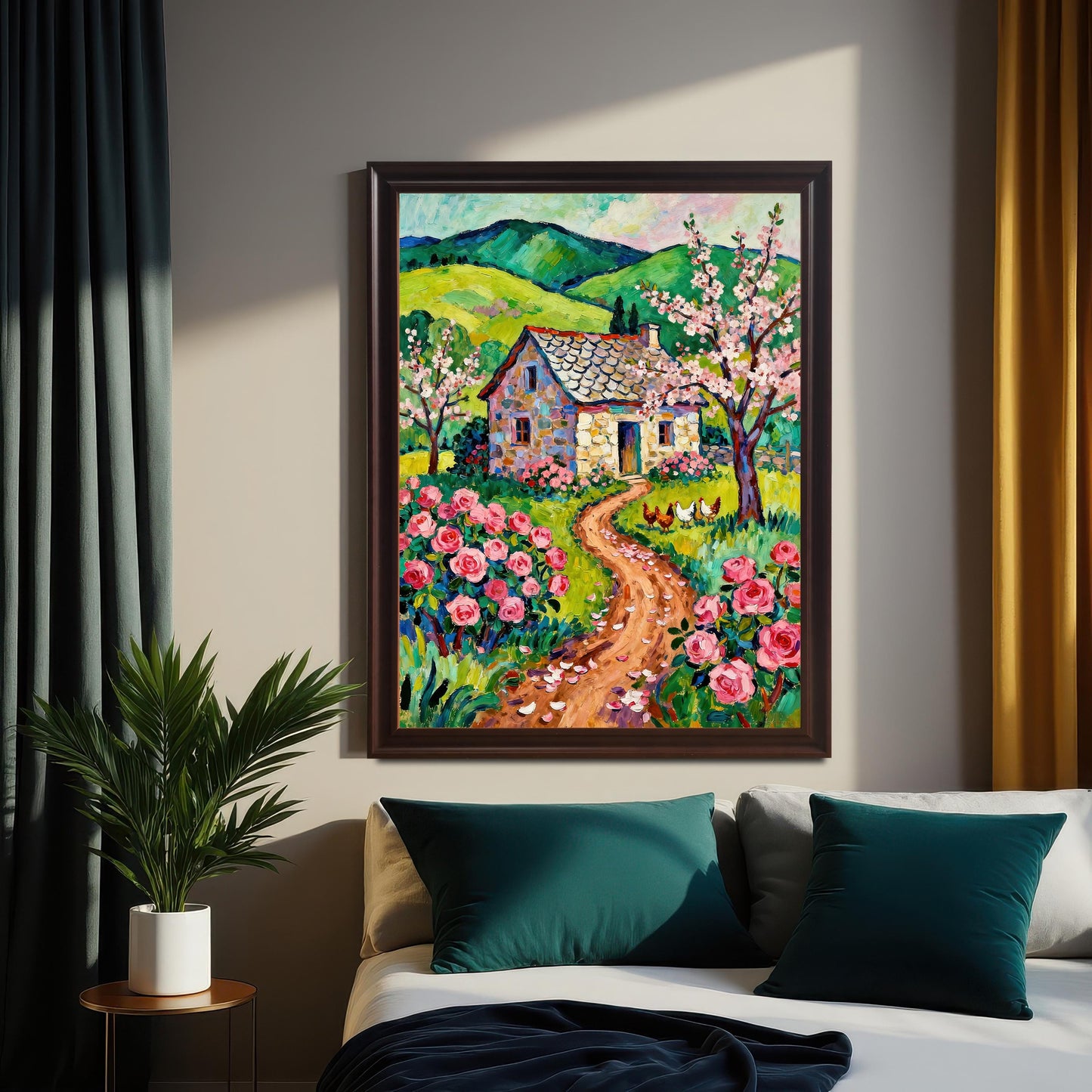 A framed oil painting of a cottage hangs on a gray wall above a bed with teal pillows. Dark-colored drapes are to the left and yellow drapes to the right.