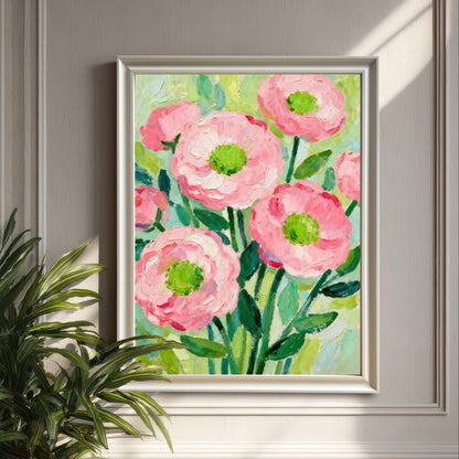 A textured painting of pink flowers with bright green centers in a white frame, hanging on a gray-paneled wall with a houseplant to its left.