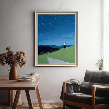 Framed starry night dog print in a Light Gold/Silver frame hanging on a gray textured wall above a wooden table and a dark leather armchair, in a brightly lit room.