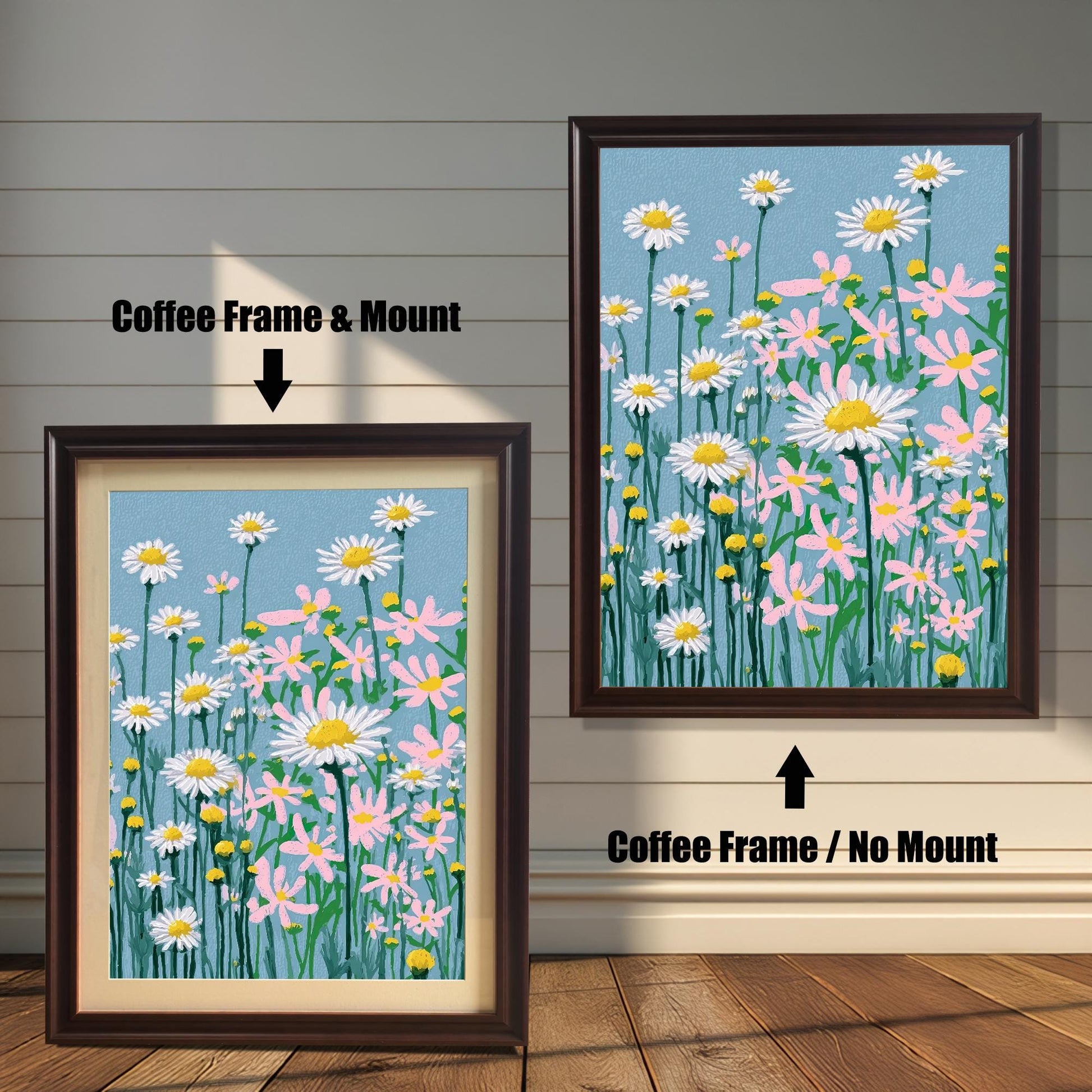 A framed art print of the daisy field illustration, displayed in two dark brown, Coffee Frame options: one on the right with No Mount, and one on the left with a Mount (a light-colored mat).