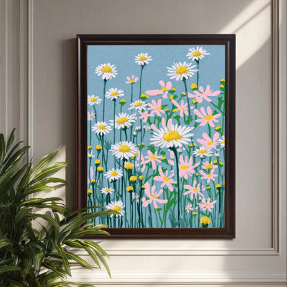 A framed art print of the daisy field illustration, set in a Coffee/Dark Brown frame, hanging on a white paneled wall beside a large green houseplant.