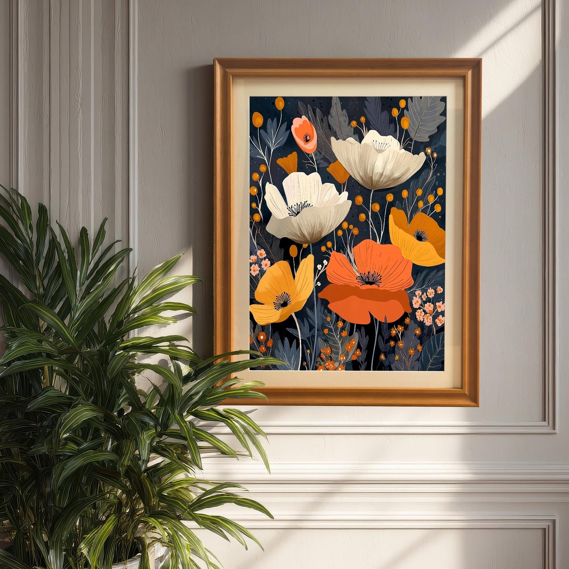 The framed abstract poppy artwork is hanging on a dark gray paneled wall. The Orange/light brown wooden frame includes a mount (matting). A large green houseplant is visible in the foreground.