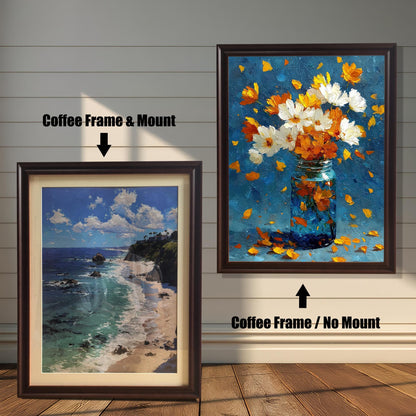 Two framed artworks with Coffee (dark brown) frames. The image on the left is a coastal landscape with a cliff and beach, shown with a Mount. The image on the right is a floral painting, shown with No Mount.