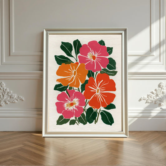 A framed botanical print featuring four flowers—two pink and two orange/red—with green leaves, leaning against a white wainscoted wall and resting on a hardwood floor. The frame is a thin, light white color.