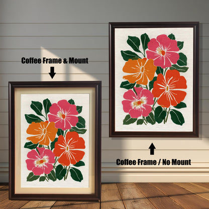 Two framed versions of the botanical print side-by-side against a white wooden wall. The image on the left, labeled "Coffee Frame & Mount," has a dark brown frame and a light-colored mat (mount). The image on the right, labeled "Coffee Frame / No Mount," has the same dark brown frame but no mat.