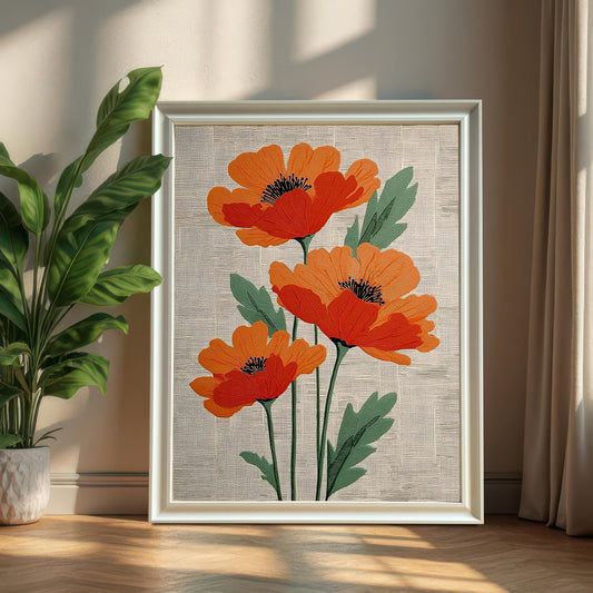 A framed print of three stylized orange poppies, framed in a White Frame, is leaning on a wood floor next to a potted green plant and neutral curtains. The print is framed with no mount.