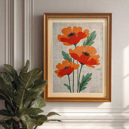Lifestyle photo showing the framed artwork of three stylized orange poppies with a light-colored mount, hanging on a white paneled wall. The frame is a light brown/Orange. A potted dark green plant is partially visible on the left.