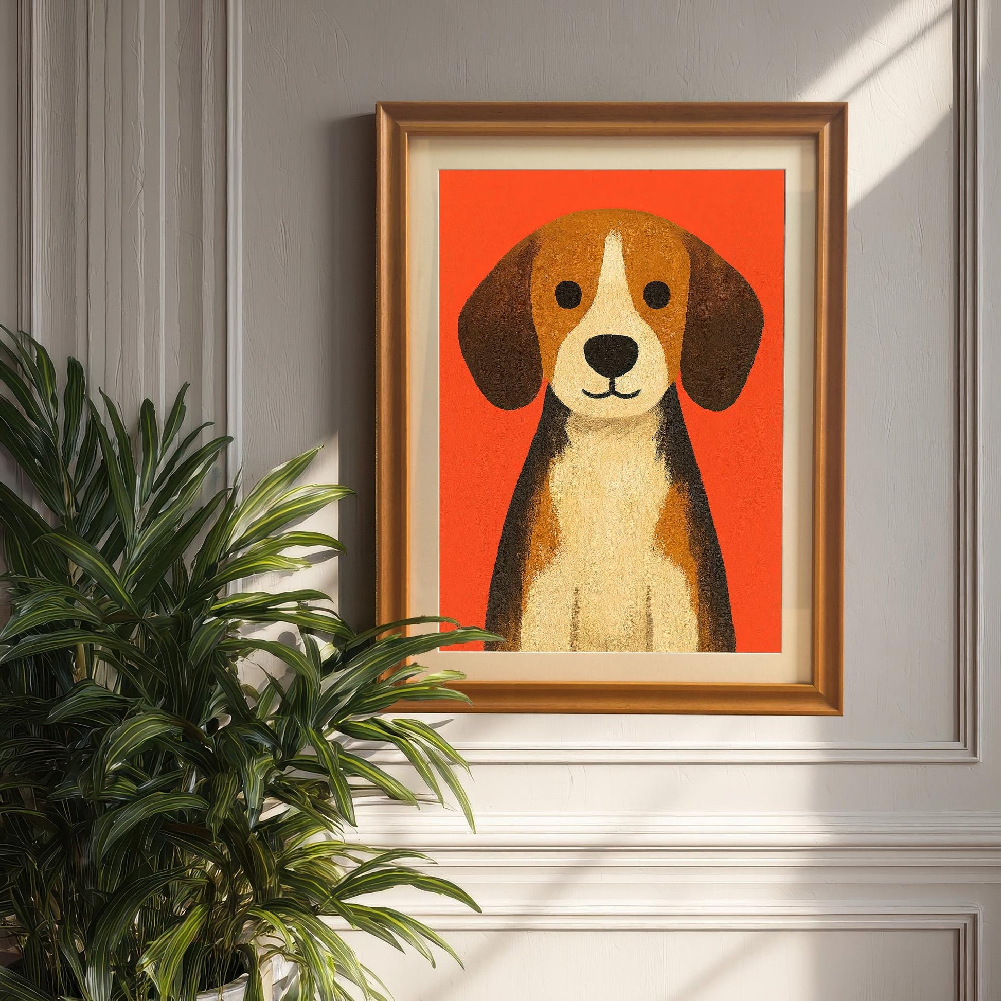 Beagle dog art print in an Orange wood frame hanging on a light gray wainscoted wall, next to a large potted green plant.