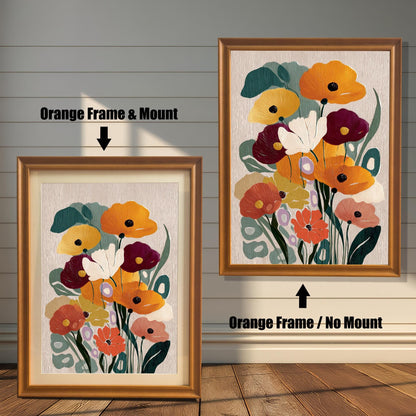 Abstract floral art print shown in two orange/light brown wood frames. The lower framed image includes a white mat/mount, while the one on the wall is framed without a mat.