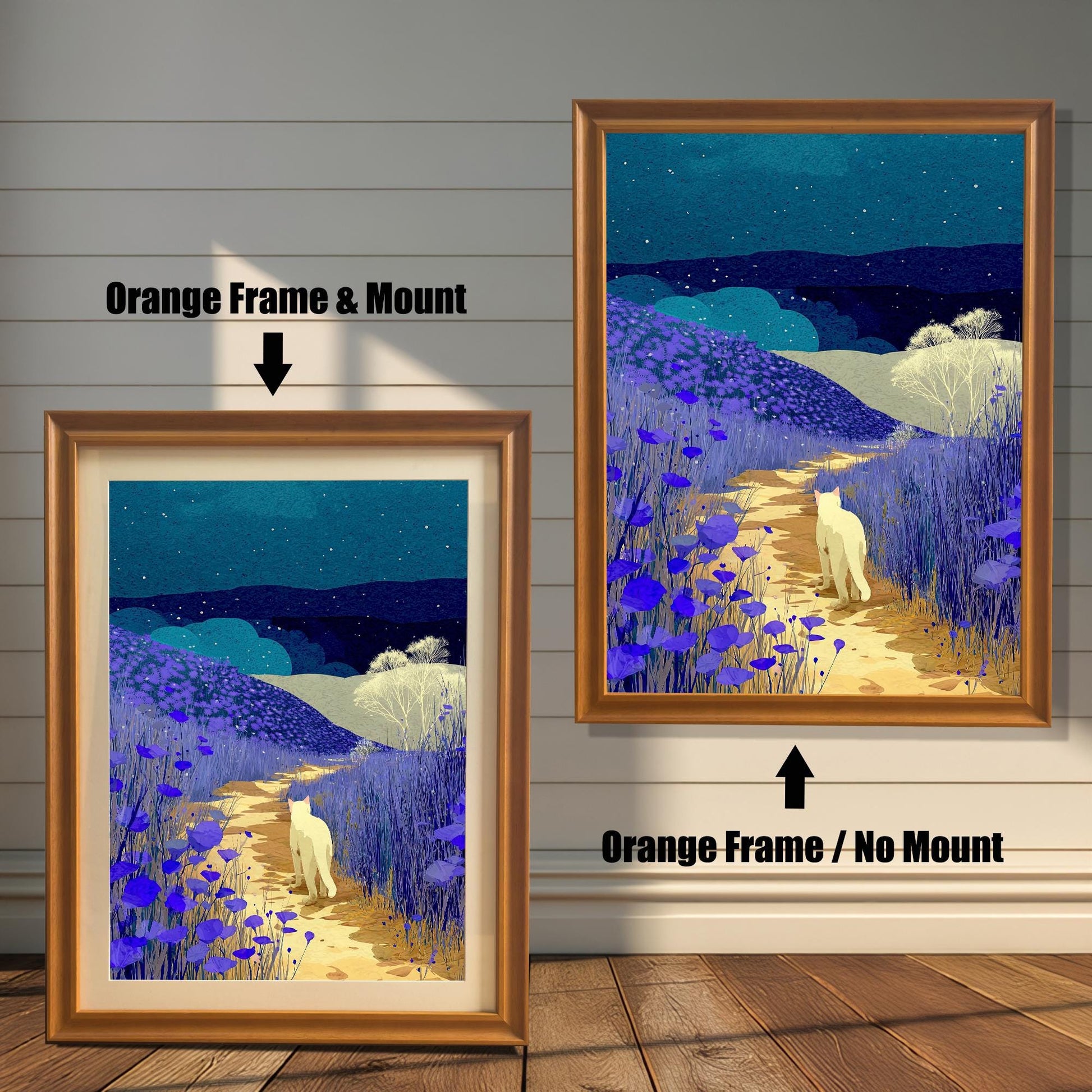 Comparison image showing two framed prints of a white cat walking on a path surrounded by purple flowers under a starry night sky. The left print has an Orange frame and a light-colored mount (matting), labeled "Orange Frame & Mount." The right print has an Orange frame with no mount, labeled "Orange Frame / No Mount."