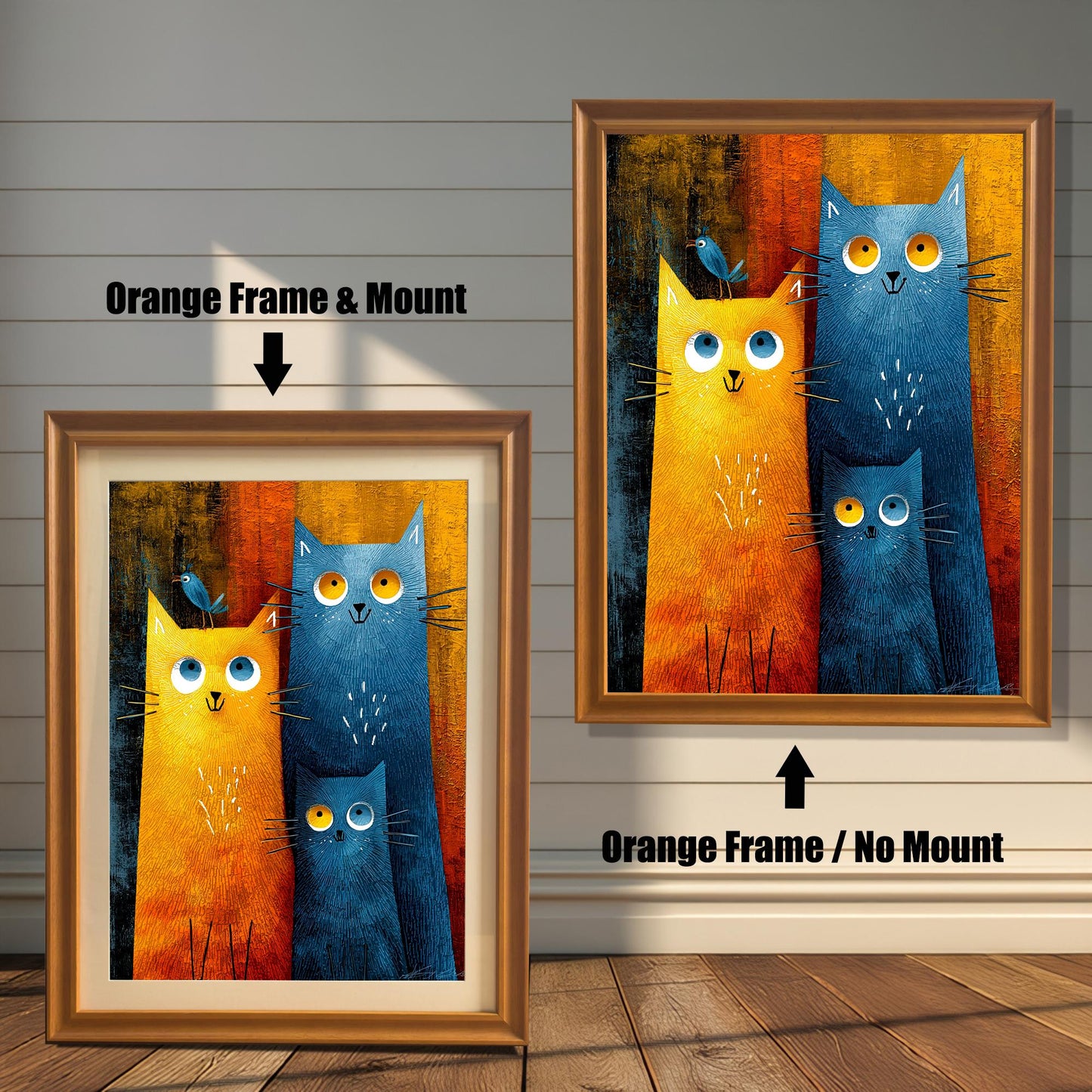 Comparison image showing two framed prints of the cat art against a white wooden-paneled wall. The left print has an Orange frame and a cream-colored mount (matting), labeled "Orange Frame & Mount." The right print has an Orange frame with no mount, labeled "Orange Frame / No Mount."