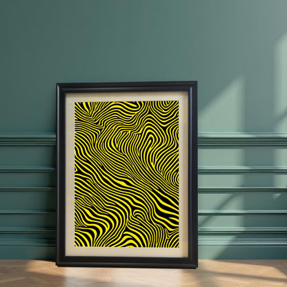 The abstract yellow and black striped print, framed in a Black frame with a mount, leaning on a hardwood floor against a decorative dark green paneled wall.