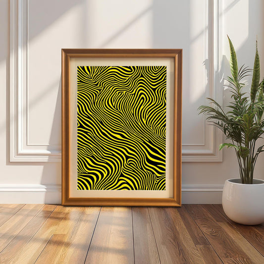 The abstract yellow and black striped print, framed in an Orange/Brown wood frame (no mount), leaning on a hardwood floor against a white paneled wall. A snake plant in a white pot is on the right.