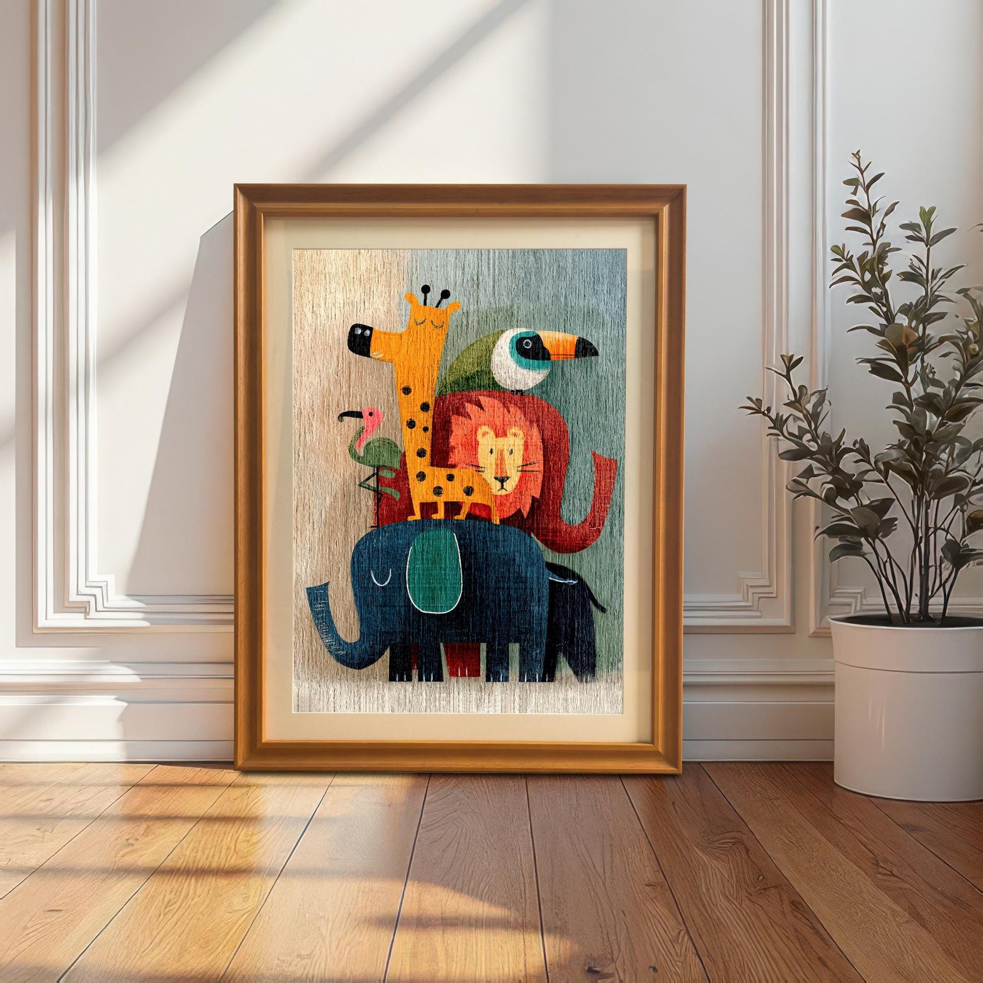 An orange-gold framed art print of the stacked cartoon animals with a mount, leaning against a white wainscoting wall, next to a potted plant.