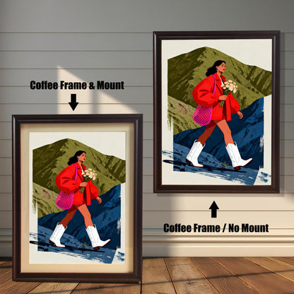 A split image showing the hiking woman print. On the left, the print is displayed in a Coffee Frame & Mount (a dark brown frame with a light border around the print). On the right, the print is shown in a Coffee Frame / No Mount.