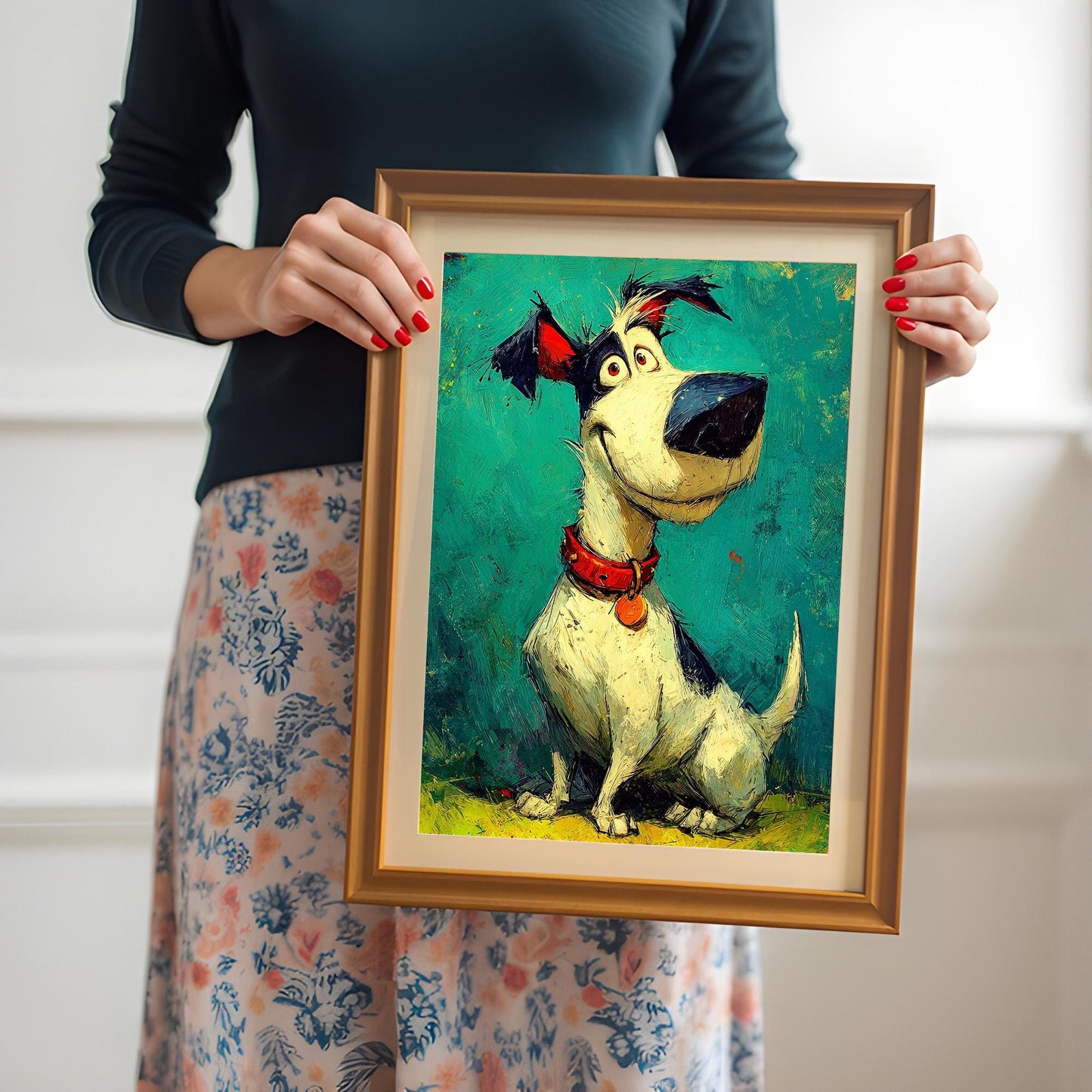 A woman holds a framed, cartoon-style painting of a smiling white and black dog with a red collar, against a teal background.