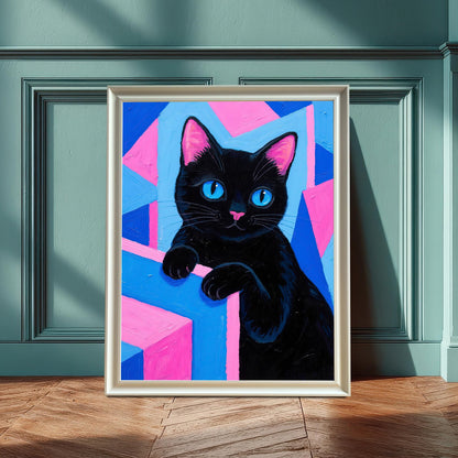 A framed art print of a black cat with blue eyes on a pink and blue geometric background, in a white frame leaning against a teal wainscoting wall.