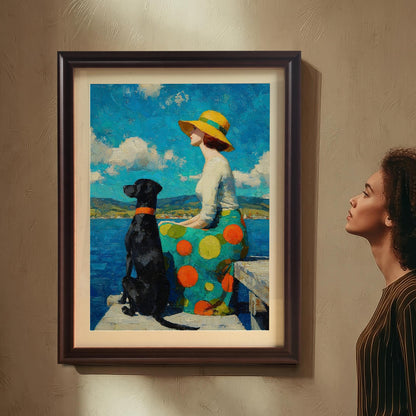 A woman in a striped shirt stands, looking up at a framed painting of a woman and her dog hanging on a beige wall.
