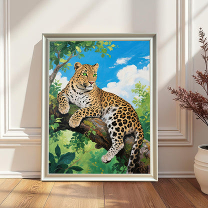 A white-framed painting of a leopard on a tree branch leans against a white wainscoting wall next to a tall, dried plant.
