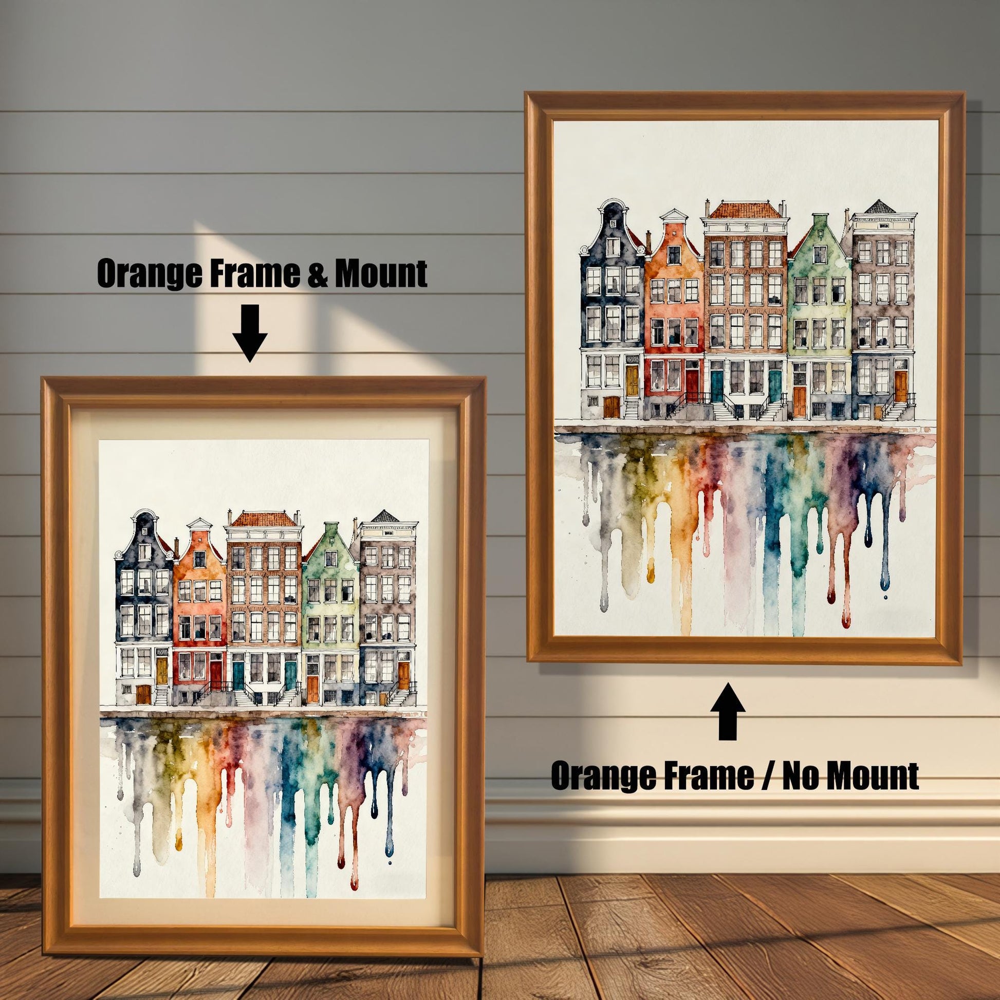 Comparison image showing the watercolor cityscape print in an Orange Frame & Mount (with a beige border/mat) on the left, and an Orange Frame / No Mount (without border) on the right.
