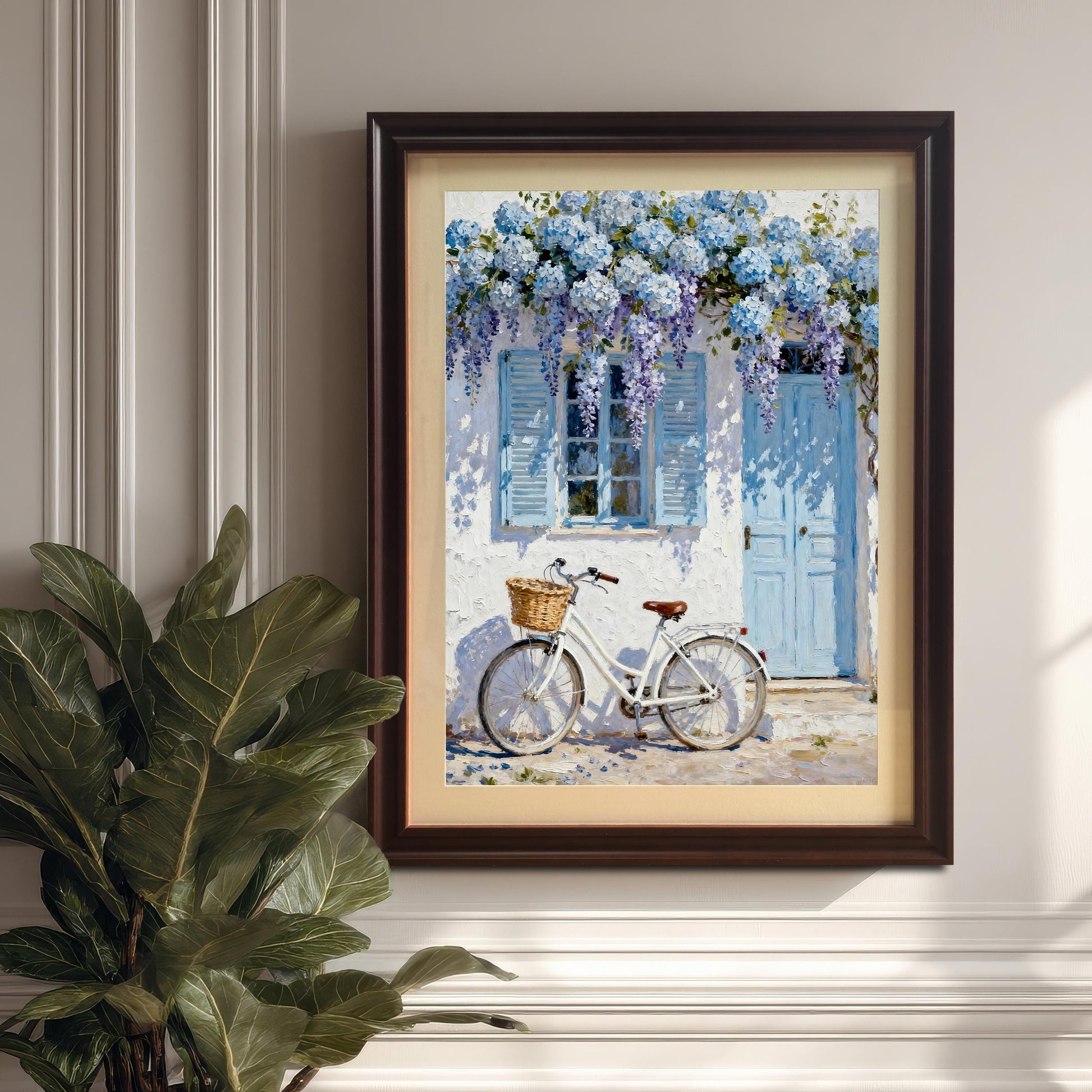 Framed art print in a Coffee wood frame with a mount hanging on a light, paneled wall, with a large houseplant partially visible in the foreground.