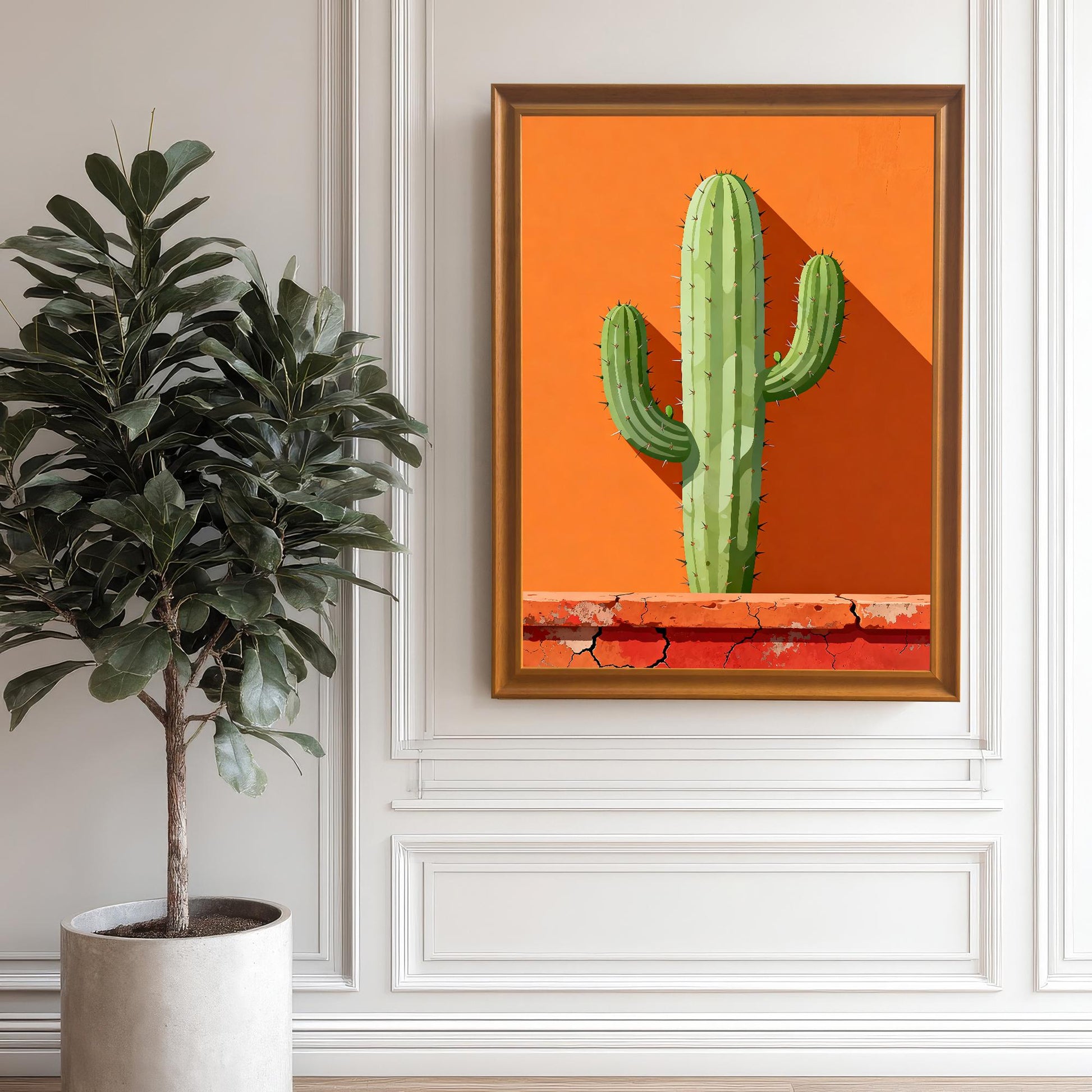 Large framed cactus art in an Orange wood frame hanging on a white paneled wall next to a large potted fig tree, emphasizing the modern desert aesthetic.