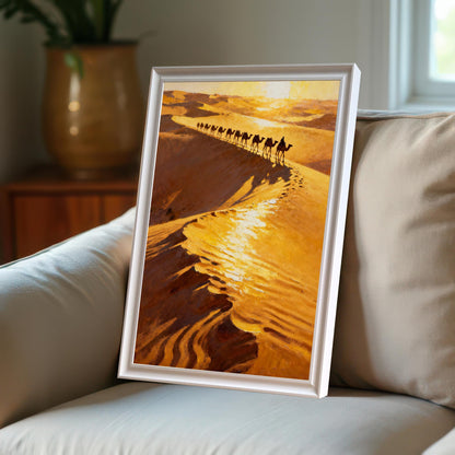 The desert camel caravan art print in a white frame, leaning on a beige couch in a home setting, showcasing the bright colors and framing option.
