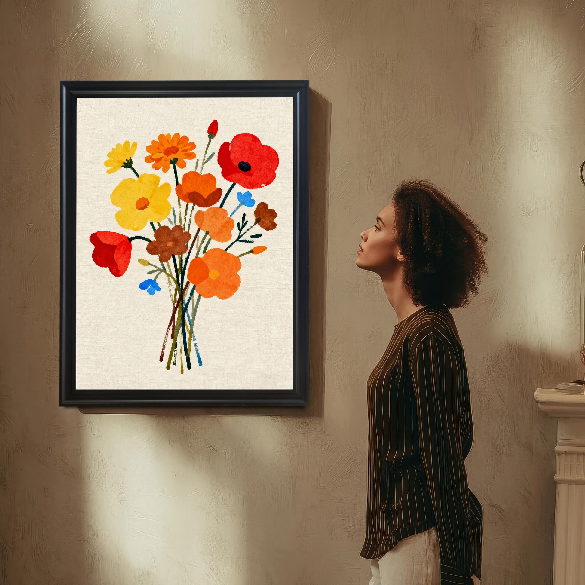 Styled photo of the floral bouquet art print in a Black frame with no mount, hanging on a textured wall, with a woman standing to the side admiring the artwork.