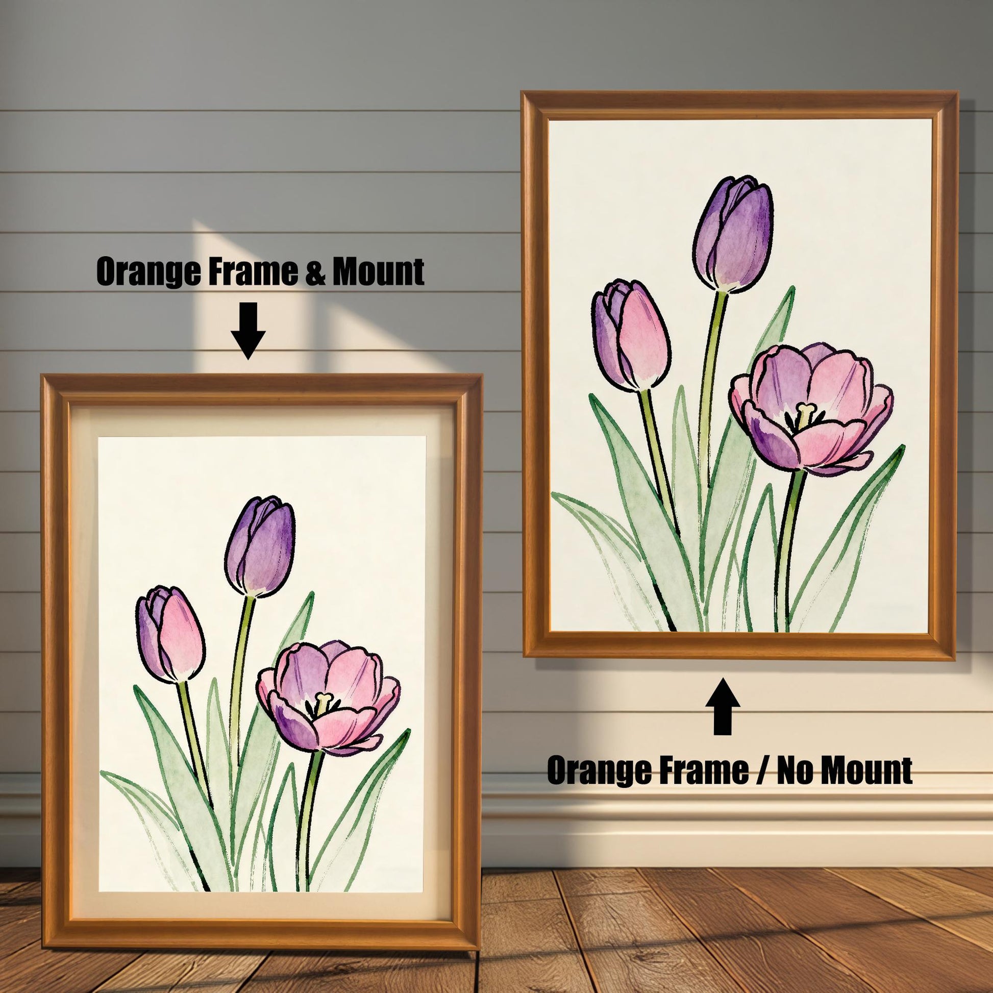 Comparison of two framed art prints on a wall. On the left, a watercolor-style print of pink and purple tulips in a framed with an Orange Frame & Mount (matting). On the right, the same art print with an Orange Frame / No Mount. Arrows indicate the frame/mount options.