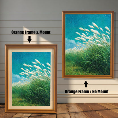 Comparison of two framed art prints on a wall. On the left, a windy grass field print in a framed with an Orange Frame & Mount (matting). On the right, the same print with an Orange Frame / No Mount. Arrows indicate the frame/mount options.